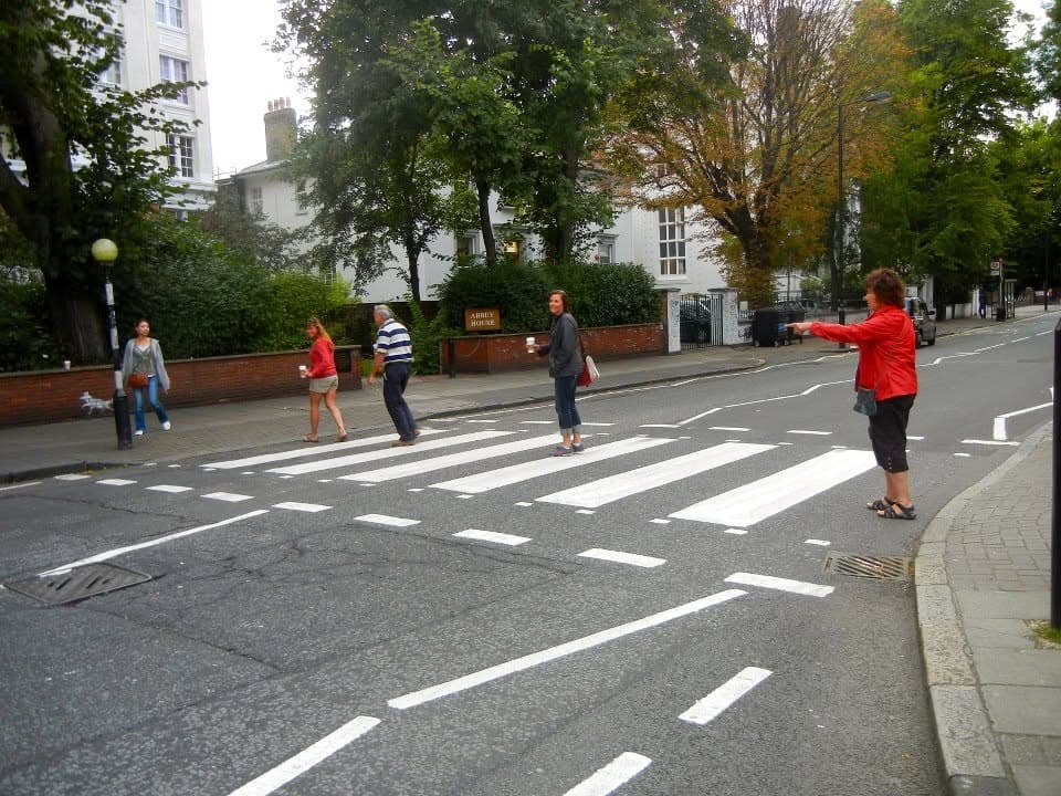 Andrea Dailey and her dad crossing Abbey Road in London