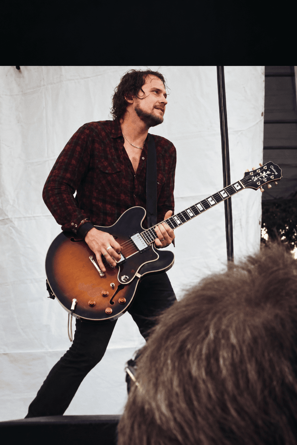 Brian Aubert of Silversun Pickups playing guitar onstage