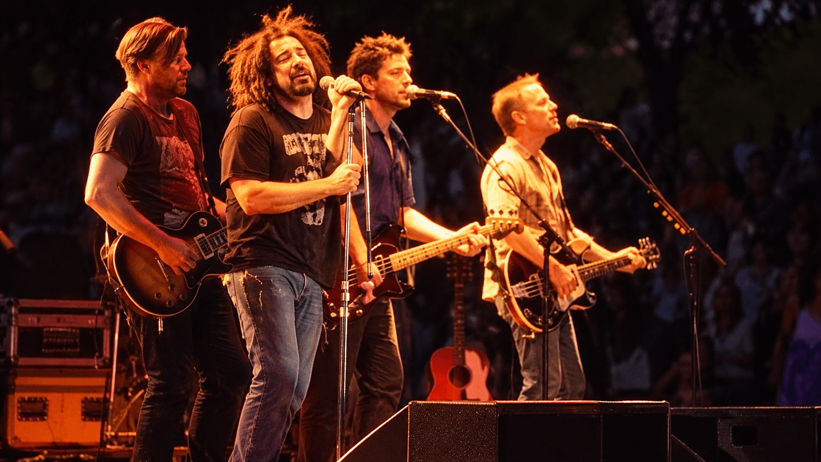 Adam Duritz and Counting Crows performing onstage