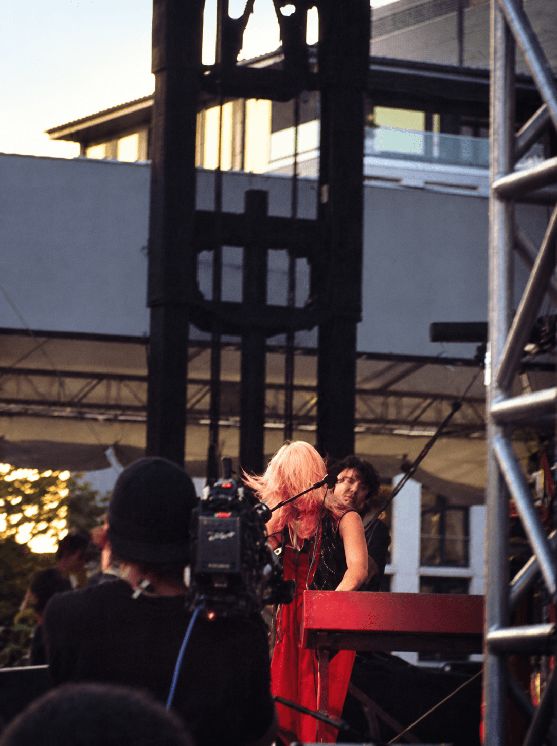 Emily Haines of Metric performing at a red keyboard