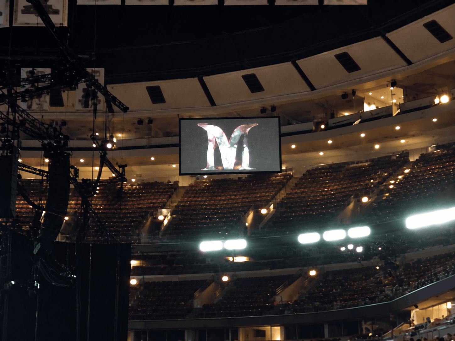 Large letter M displayed inside the arena before Madonna's concert